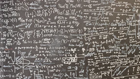 a blackboard with a lot of writing on it