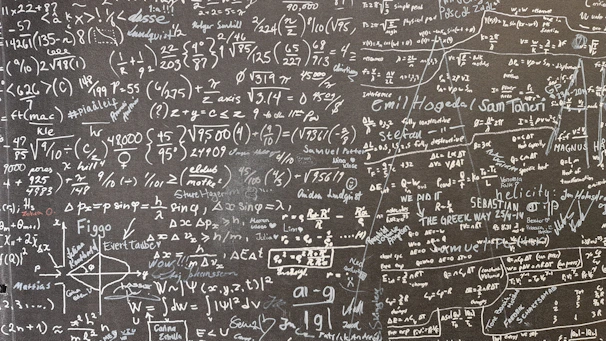 a blackboard with a lot of writing on it