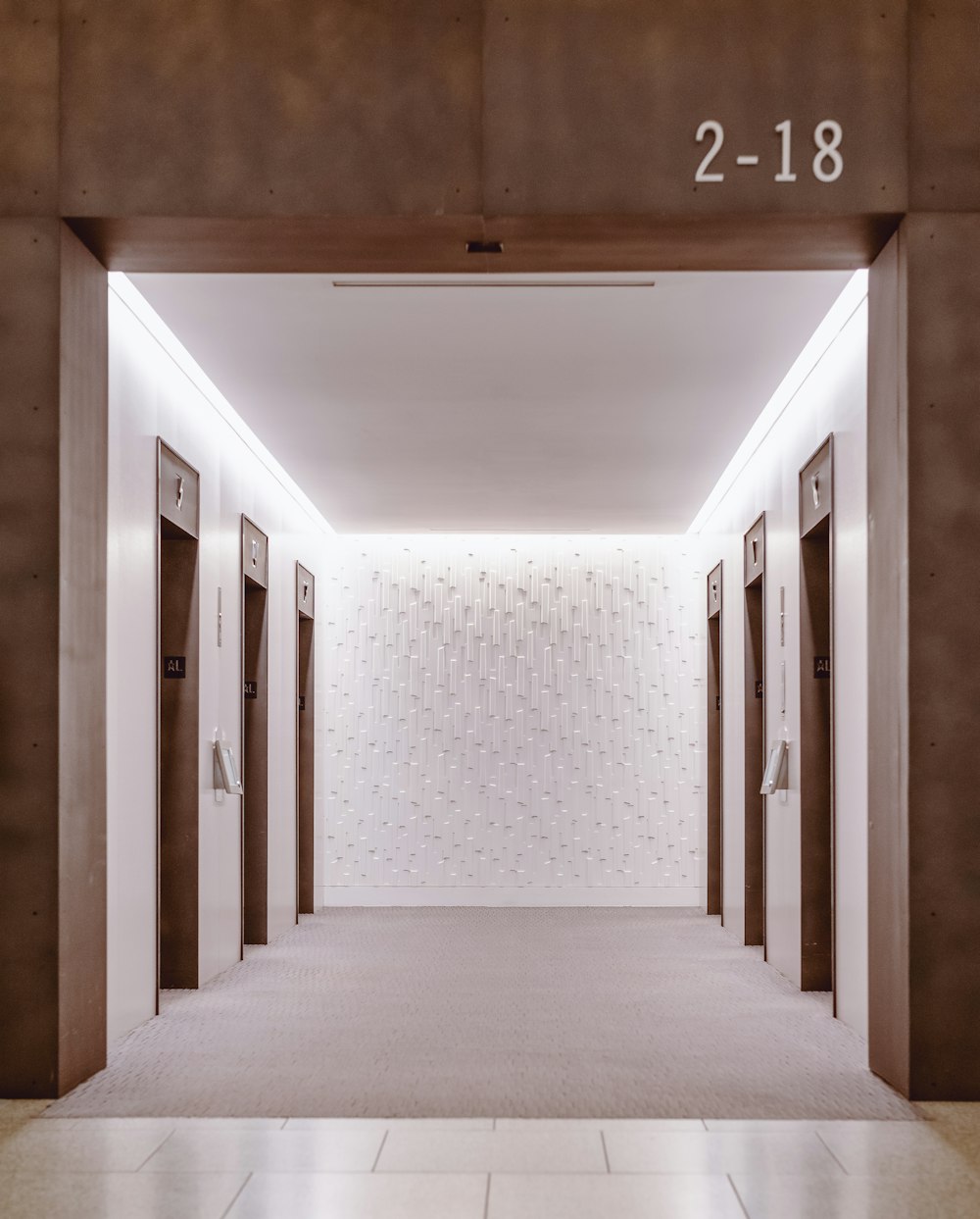 a long hallway with a number on the wall