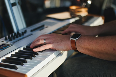 a close up of a person playing a keyboard