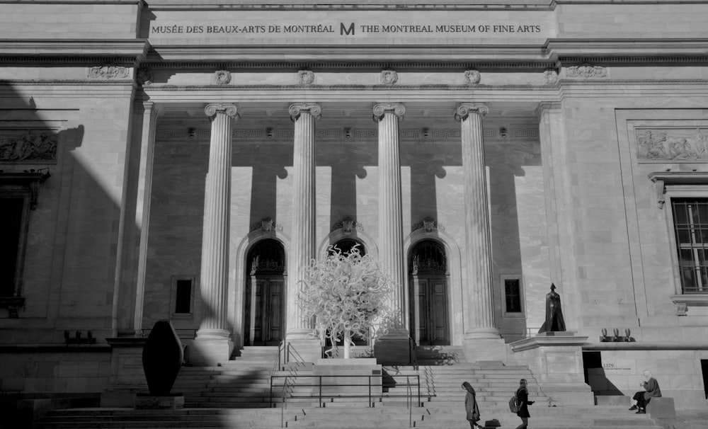 a black and white photo of the front of a building