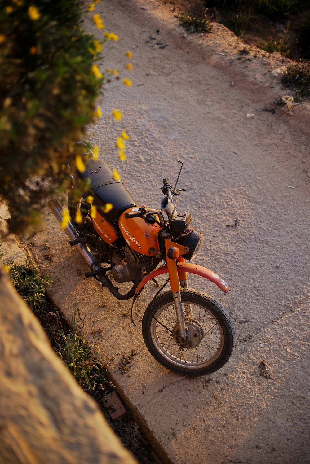 a motorcycle parked on the side of a road