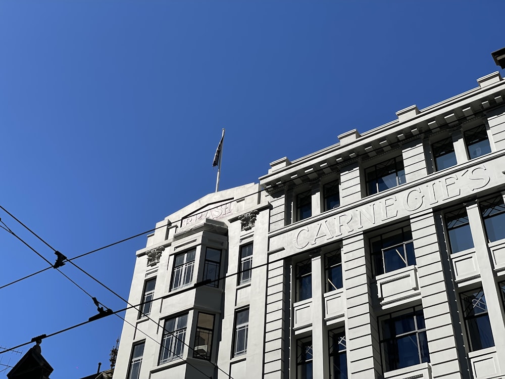 a tall building with a clock on the front of it