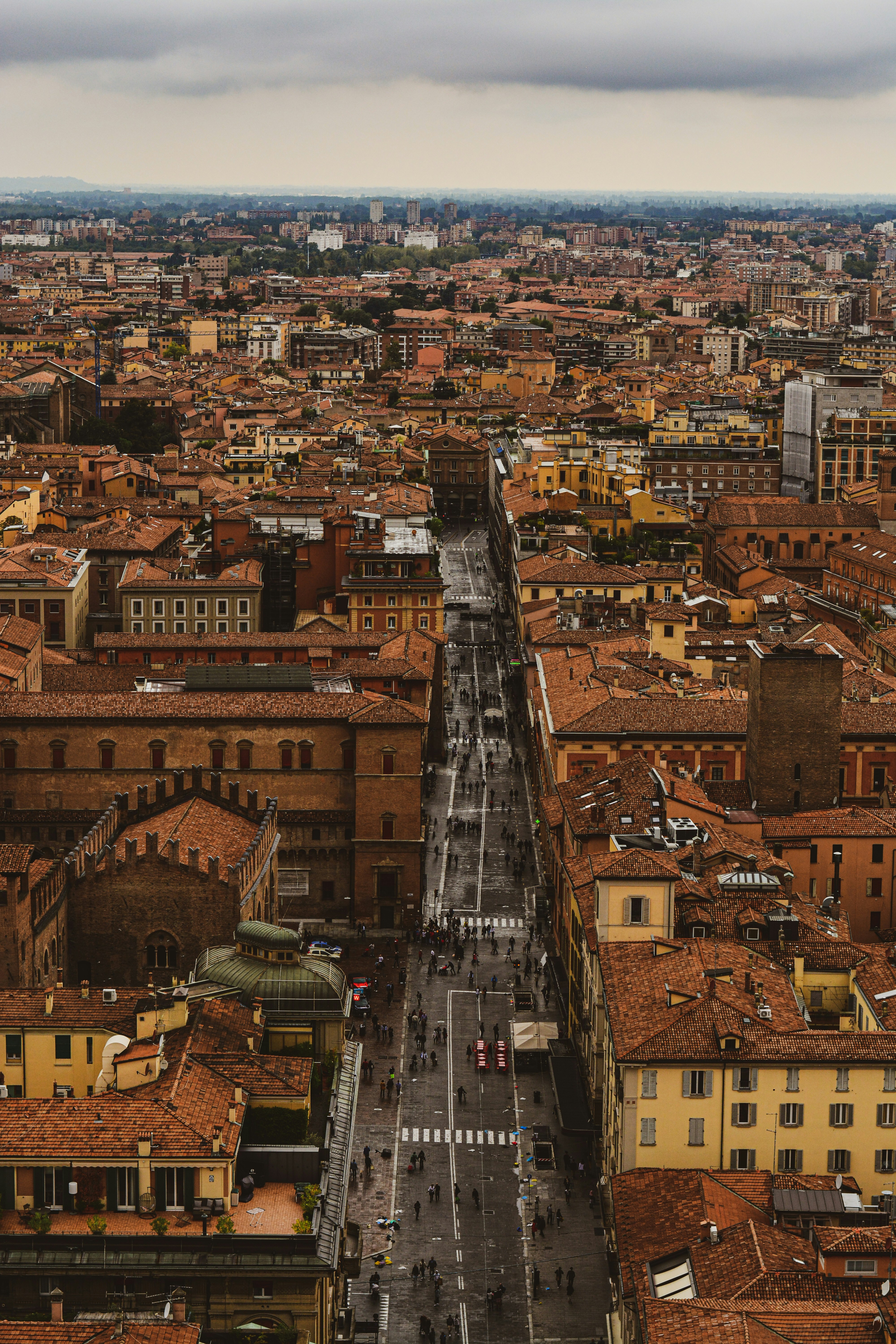 an aerial view of a city with tall buildings