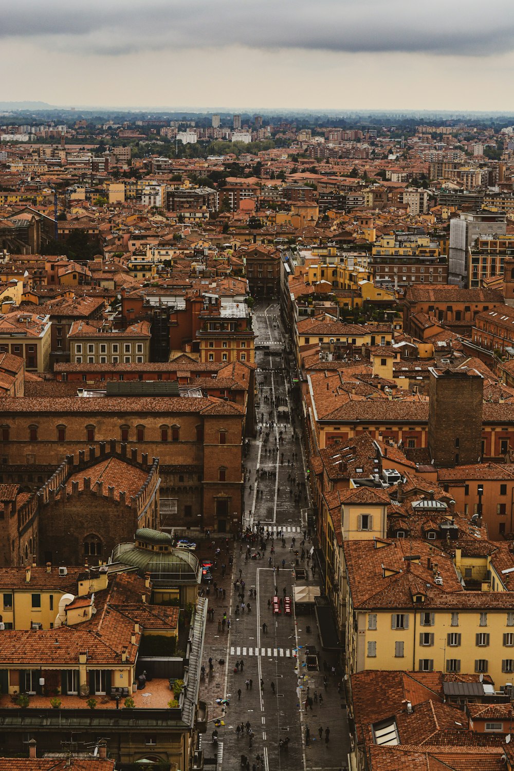 an aerial view of a city with tall buildings