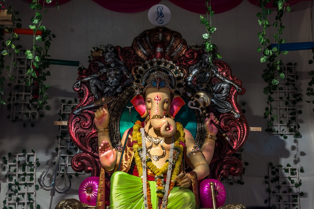 a statue of a hindu god in a temple
