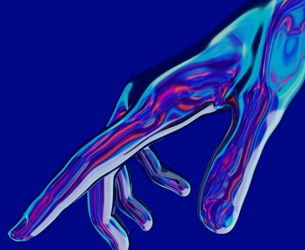 a blue and purple image of a person's hand