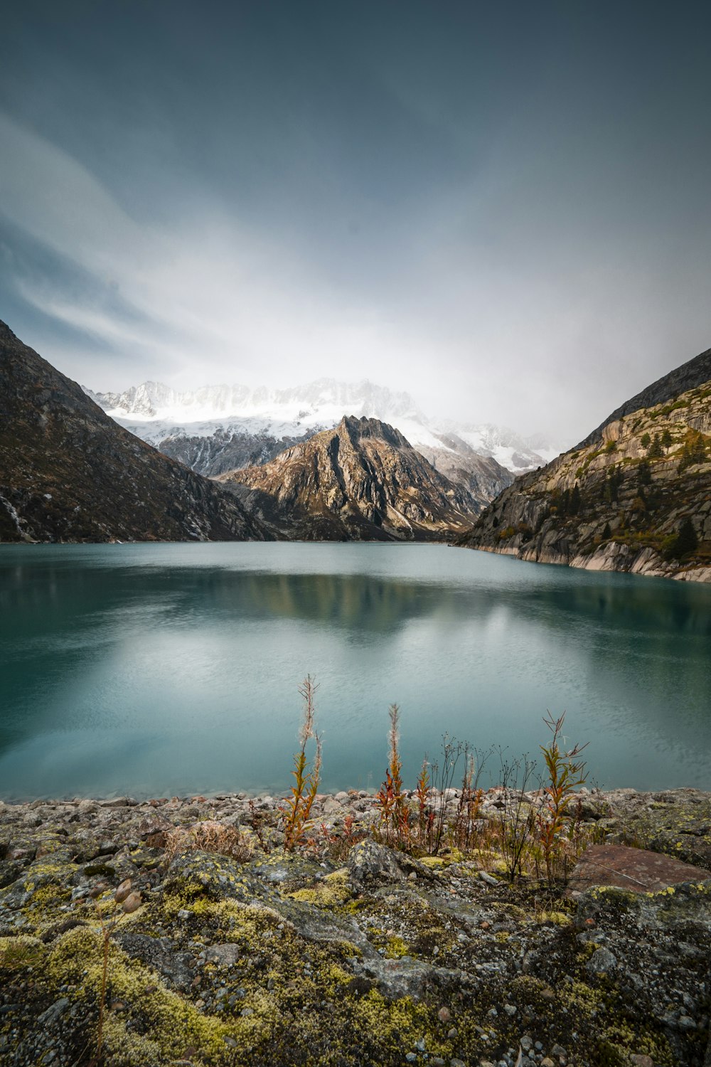 a large body of water surrounded by mountains