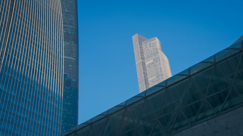 a very tall building towering over a city