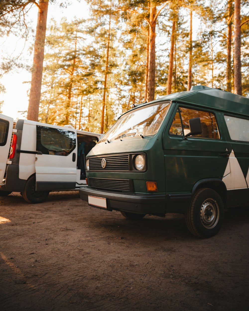 a couple of vans parked next to each other