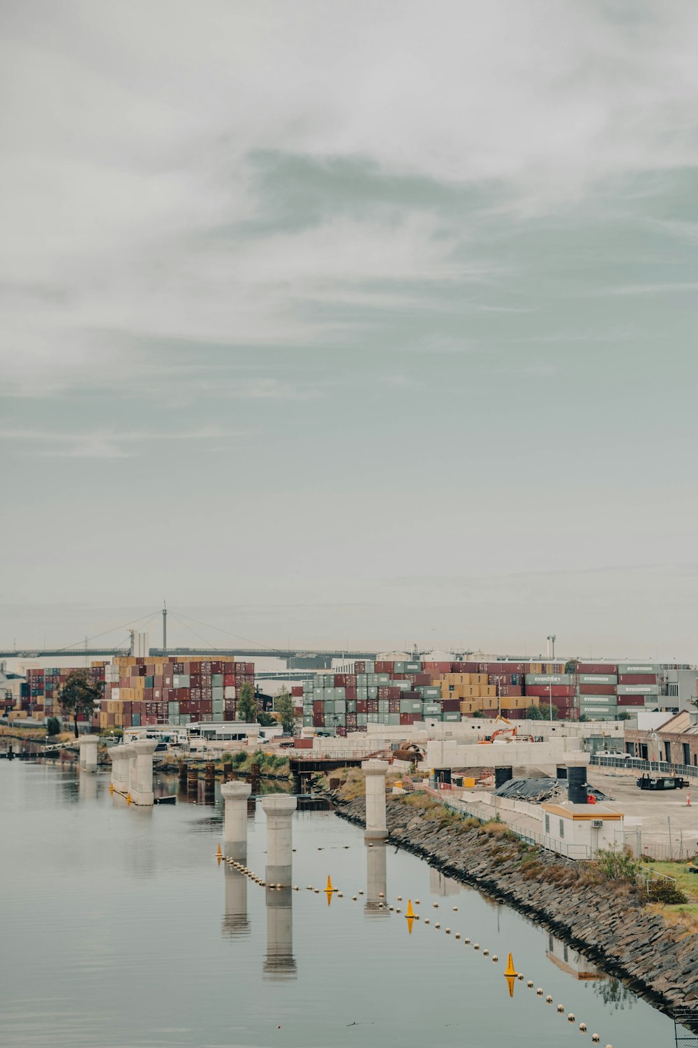 a body of water with a city in the background