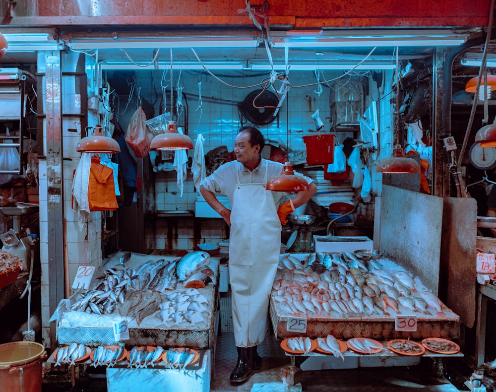 a man standing in front of a store