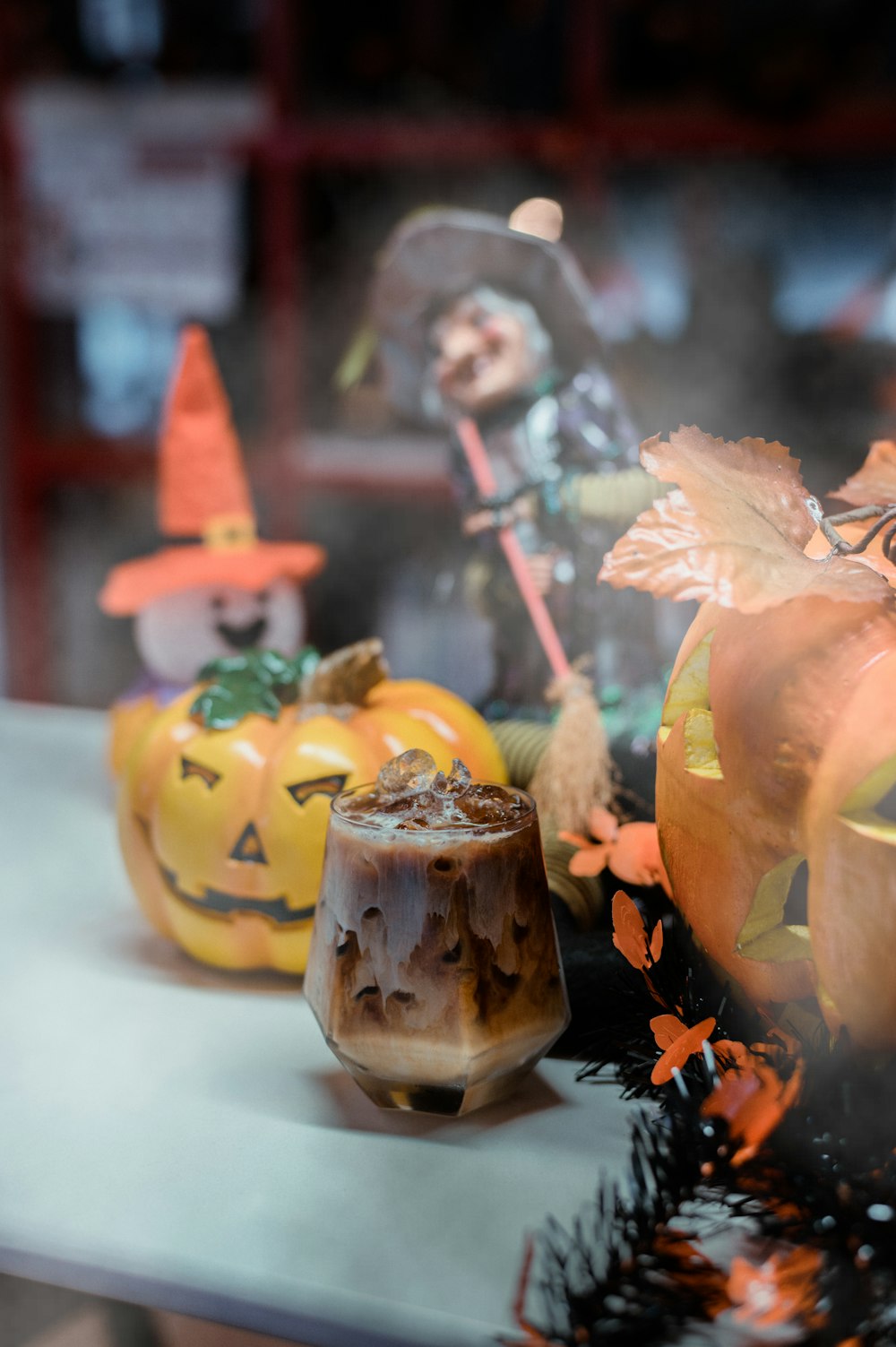 a display of carved pumpkins and other halloween decorations