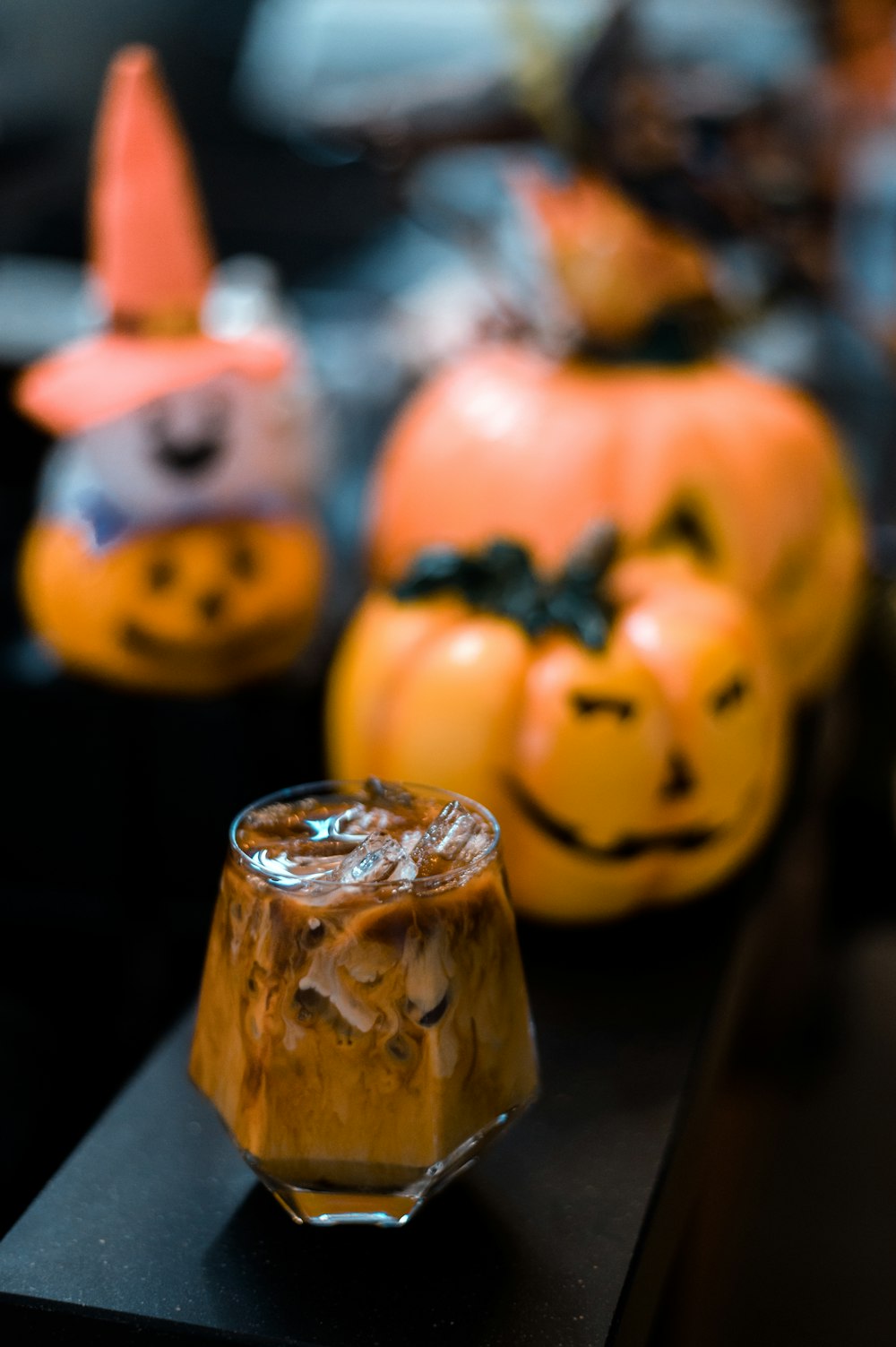 a close up of a glass of food on a table