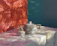 Elegant ceramic cookware set displayed on a marble kitchen countertop with soft natural light.