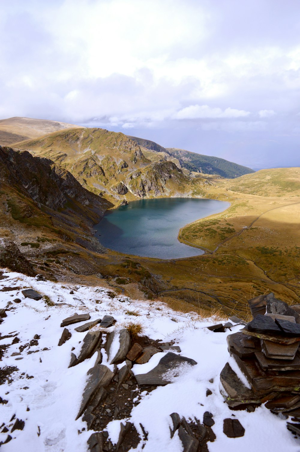 a large body of water surrounded by mountains