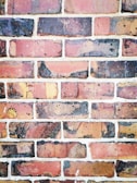Rustic brick tiles from demolition laid out for reuse