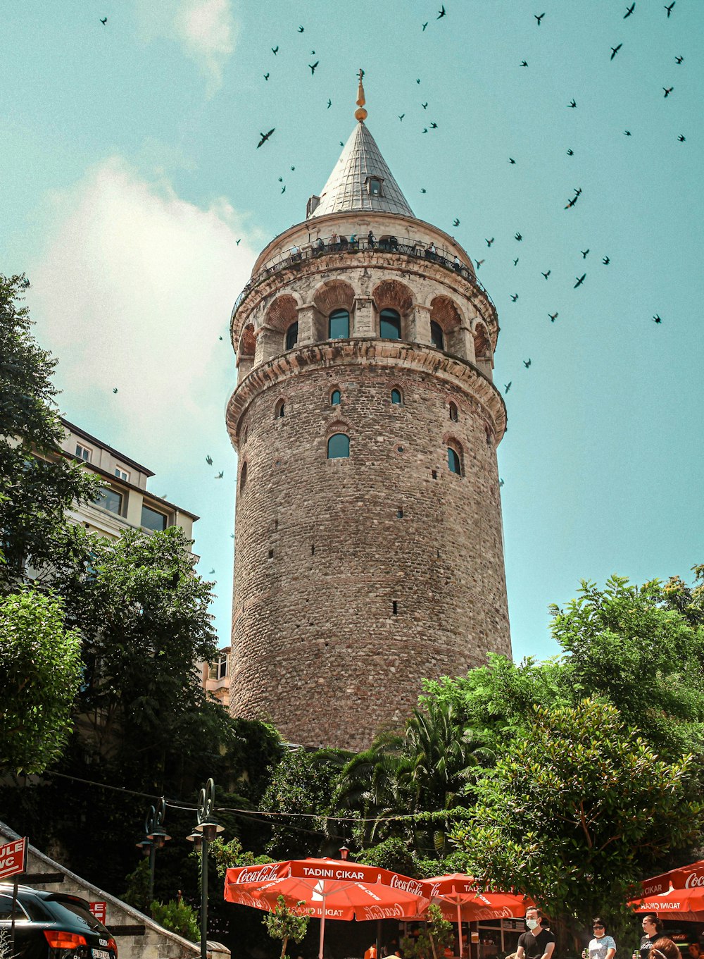 a tall tower with a clock on the top of it