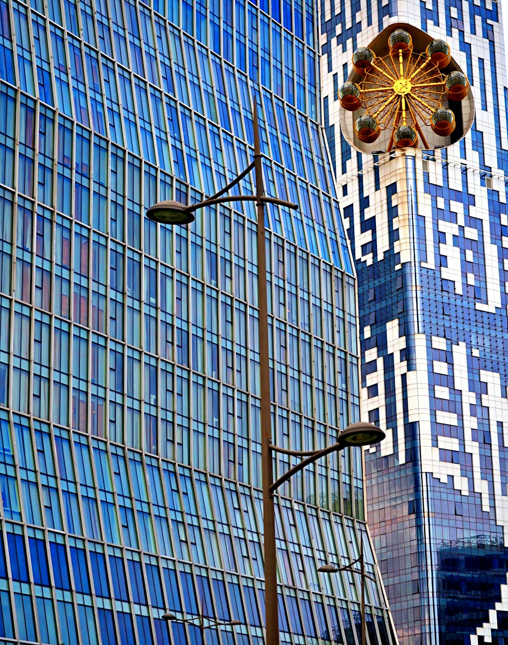 a street light next to a tall building