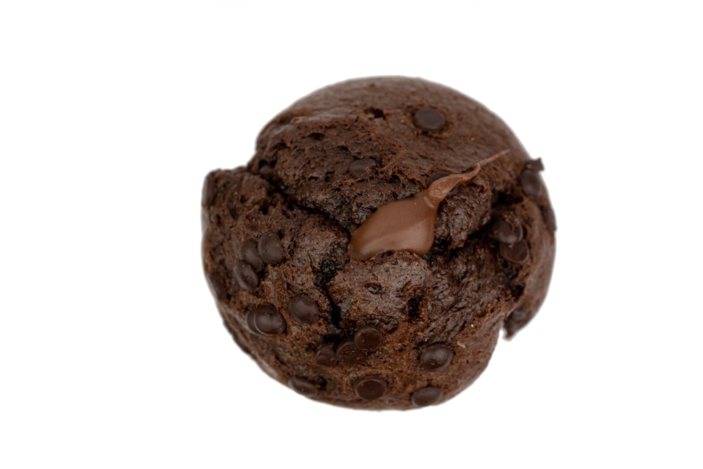 a close up of a chocolate cookie with chocolate chips