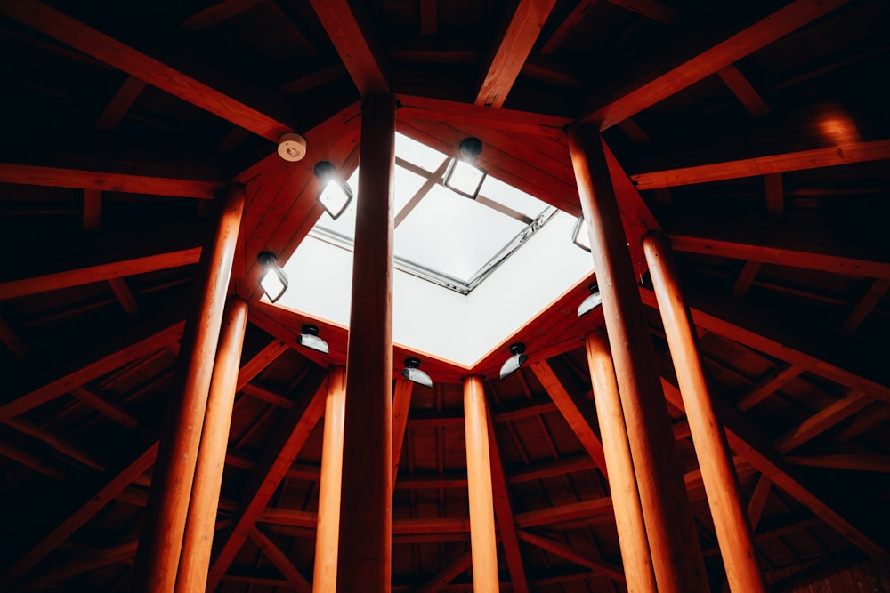 a wooden structure with a skylight inside of it