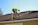 a man working on a roof with a power drill
