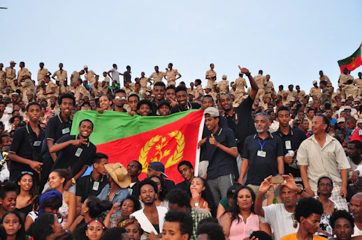 a large group of people standing next to each other