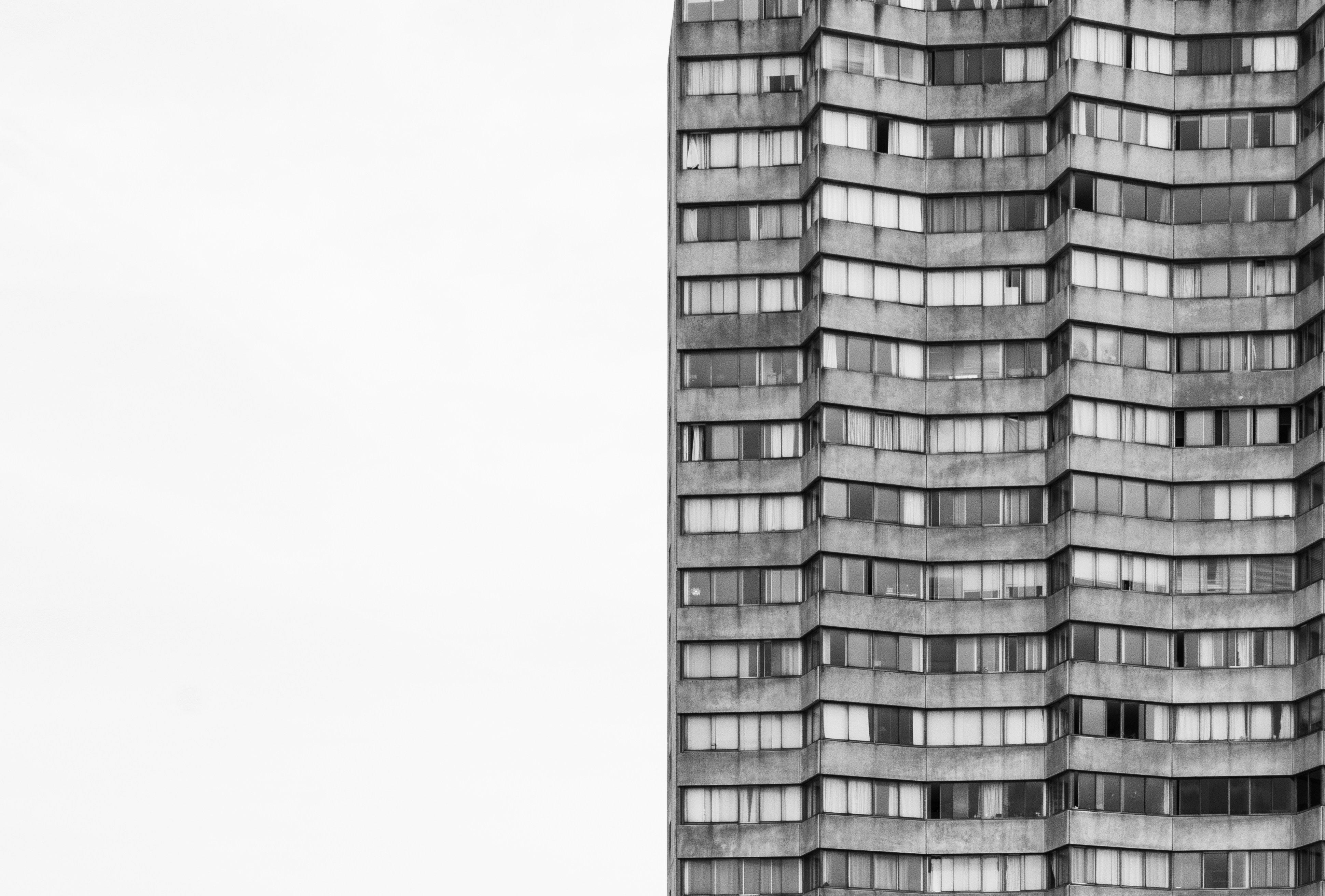 a black and white photo of a tall building