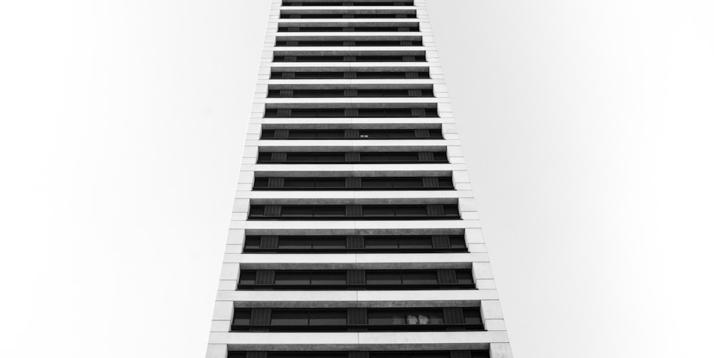 a black and white photo of a tall building