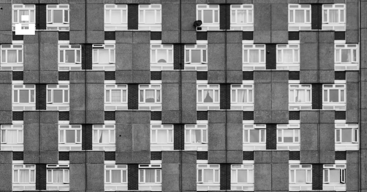 A Black And White Photo Of A Building With Windows Photo Free Grey A Black And White Photo Of A Building With Windows Photo Free Grey