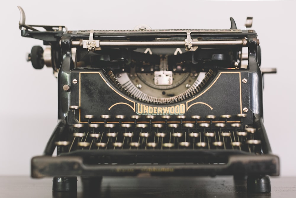 a close up of an old fashioned typewriter