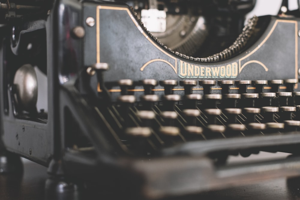 a close up of an old fashioned typewriter