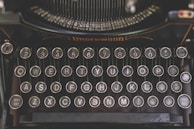 a close up of an old fashioned typewriter
