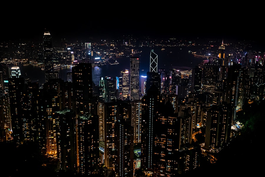 Hong Kong skyline reflected in Victoria Harbour at night