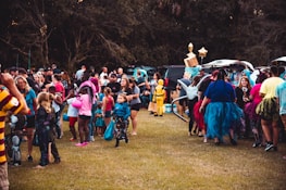 a large group of people standing around each other