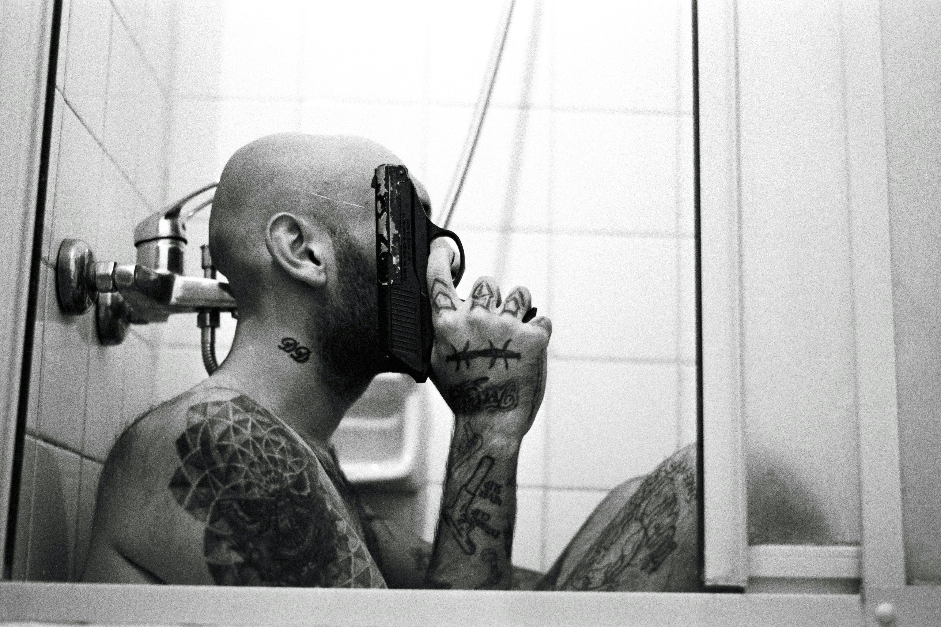 I have taken this photo with my analog camera's timer in my bathroom. Self-portrait of me. As you see in my other photos my mind is confusing sometimes like everyone. As I like colorful and positive works, I like dark works too.