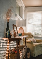 a living room with a chair and a table