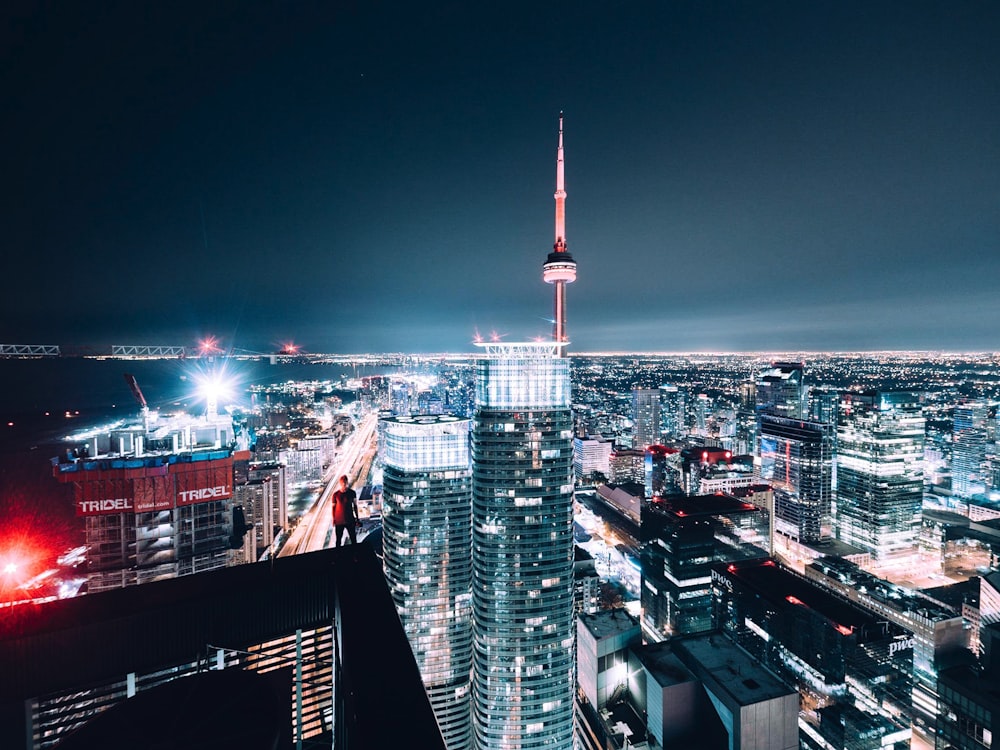 a view of a city at night from the top of a building