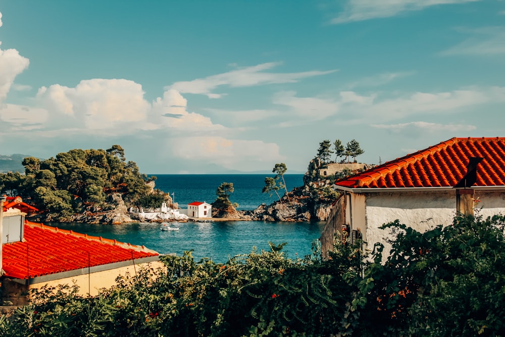 a large body of water in front of a house