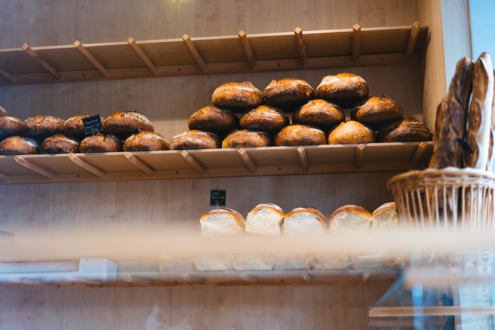 a bunch of doughnuts that are on a shelf