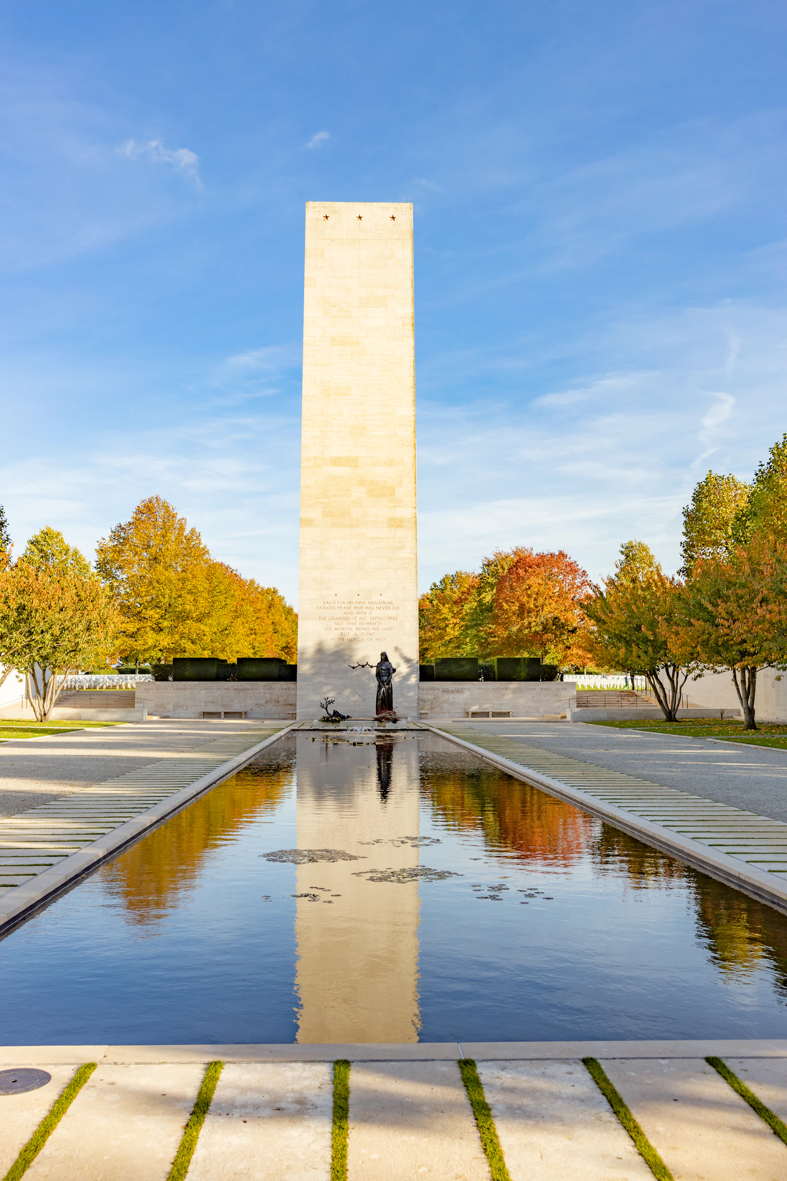 Reflecting pool and memorial building at the Netherlands American Cemetery and Memorial in Margraten, the Netherlands