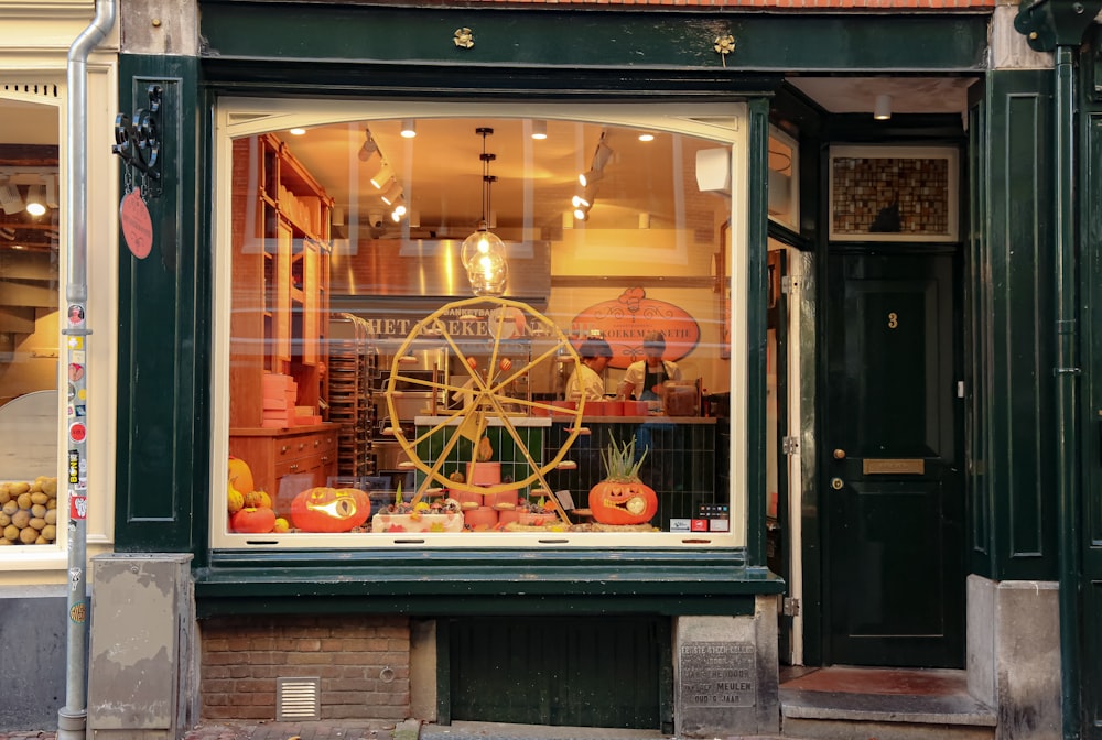 a store front with a wheel in the window