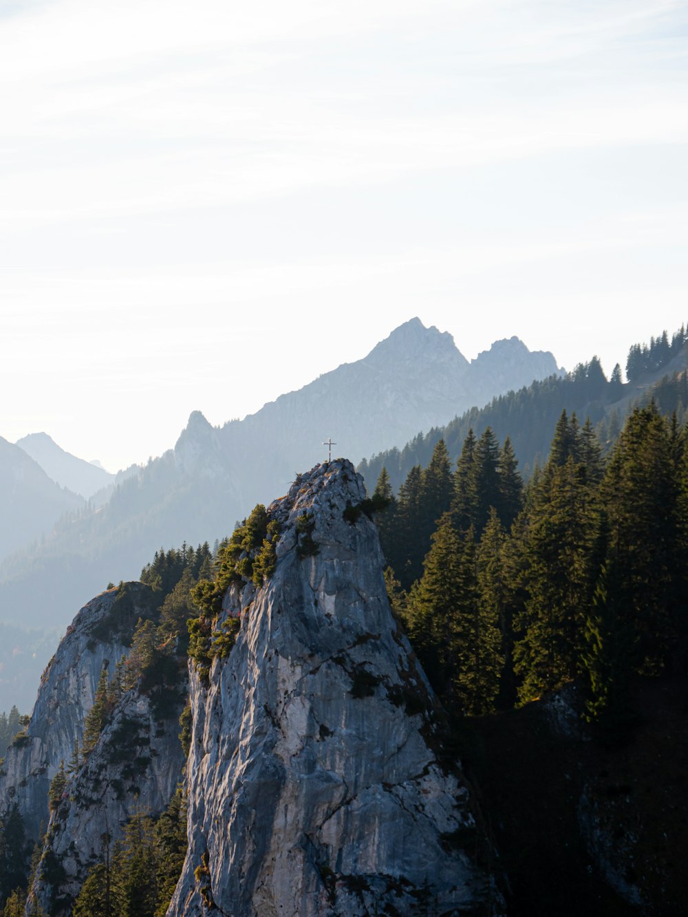 a person standing on top of a mountain