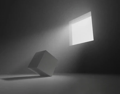 An empty room with a light coming from the ceiling