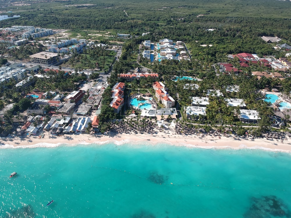 a bird's eye view of a resort on the beach