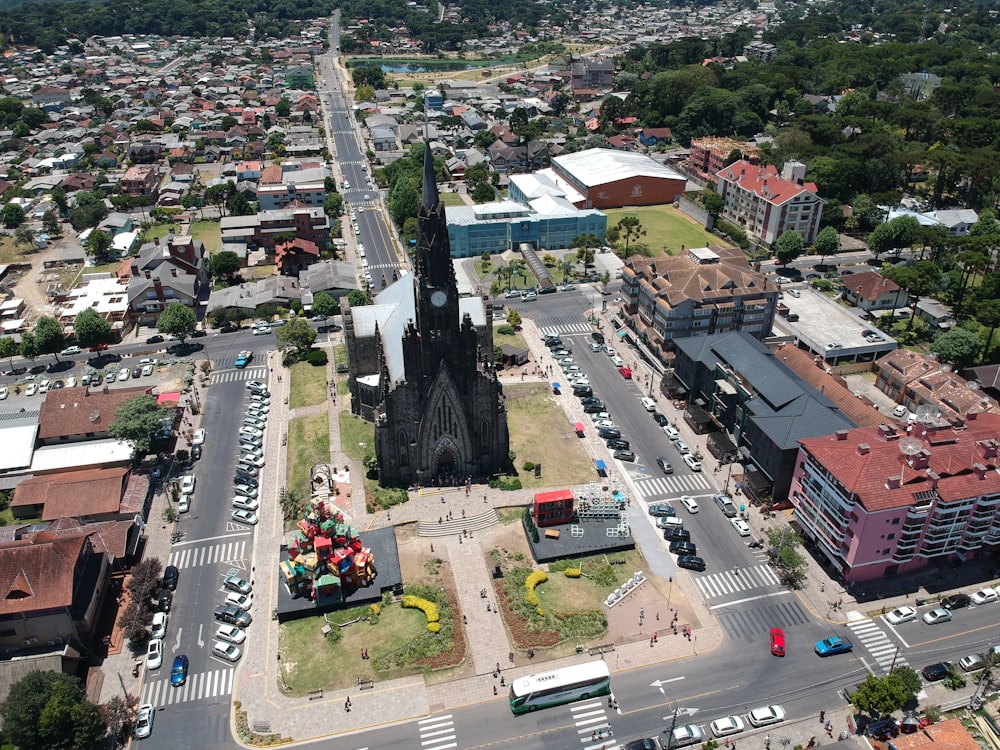 an aerial view of a city with tall buildings