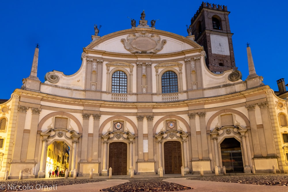 a large building with a clock on the front of it