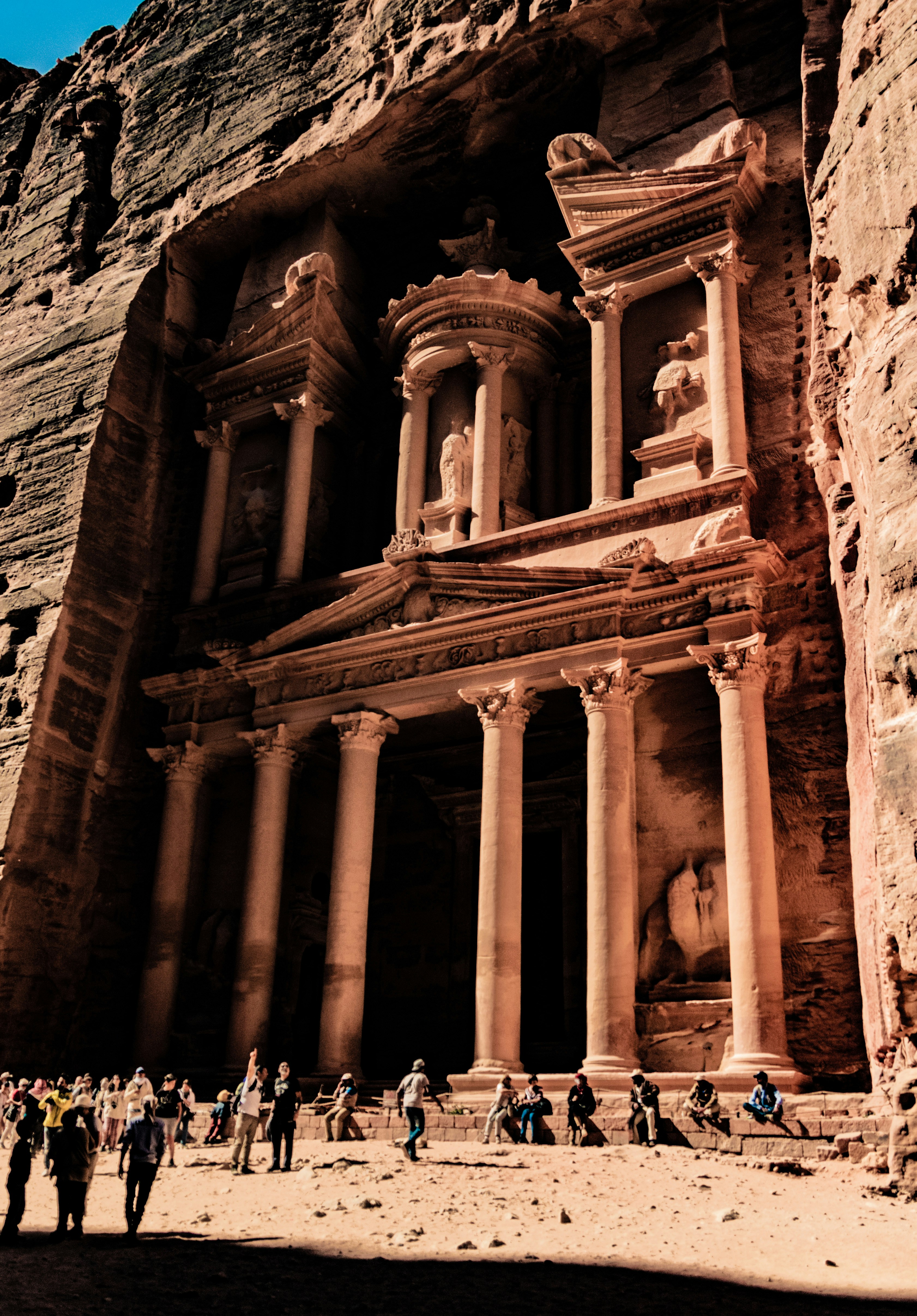 a group of people standing in front of a building
