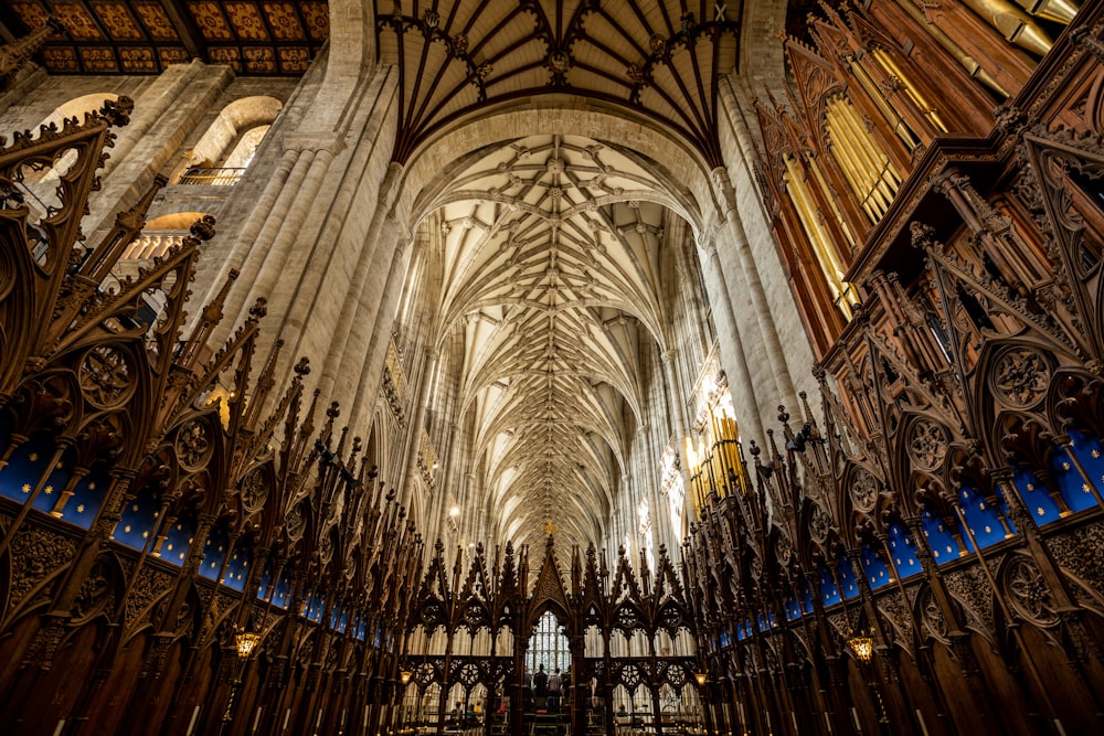 a large cathedral with a massive ceiling and many windows