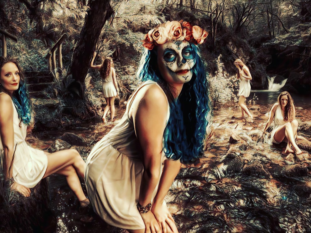 a woman with blue hair and makeup in a forest